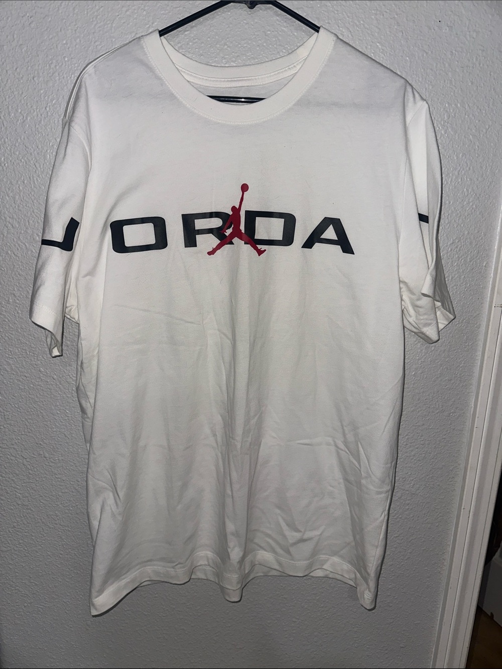 Jordan White Short Sleeve Tee with Red Jumpman and Black Lettering